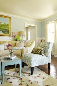 Saturday’s Swoon: Serene blue, cream living room with a pop of personality!