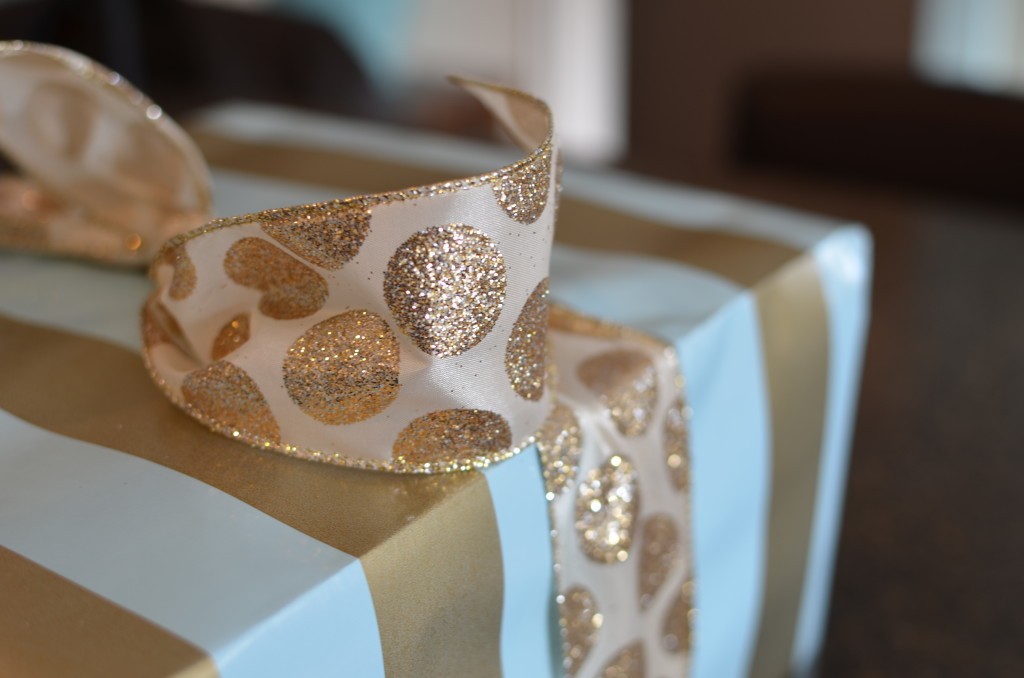 gold and white polka dot ribbon