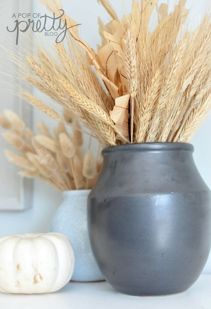 simple Fall mantel with wheat