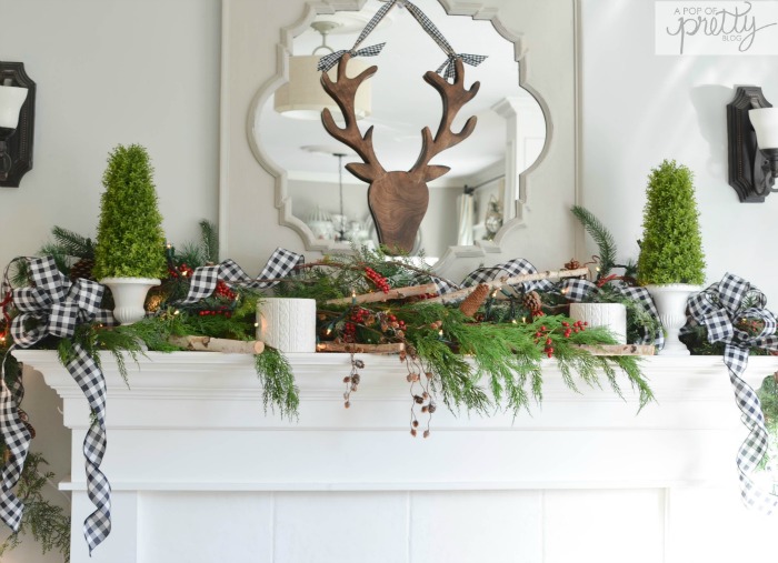 Decorated Christmas fireplace buffalo plaid ribbon