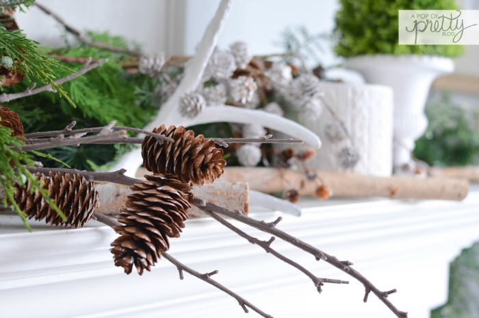 Winter mantel with greenery