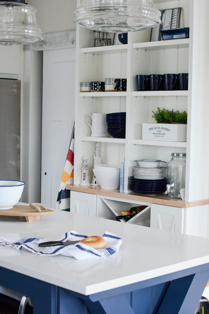 White quartz countertops vs granite in coastal kitchen