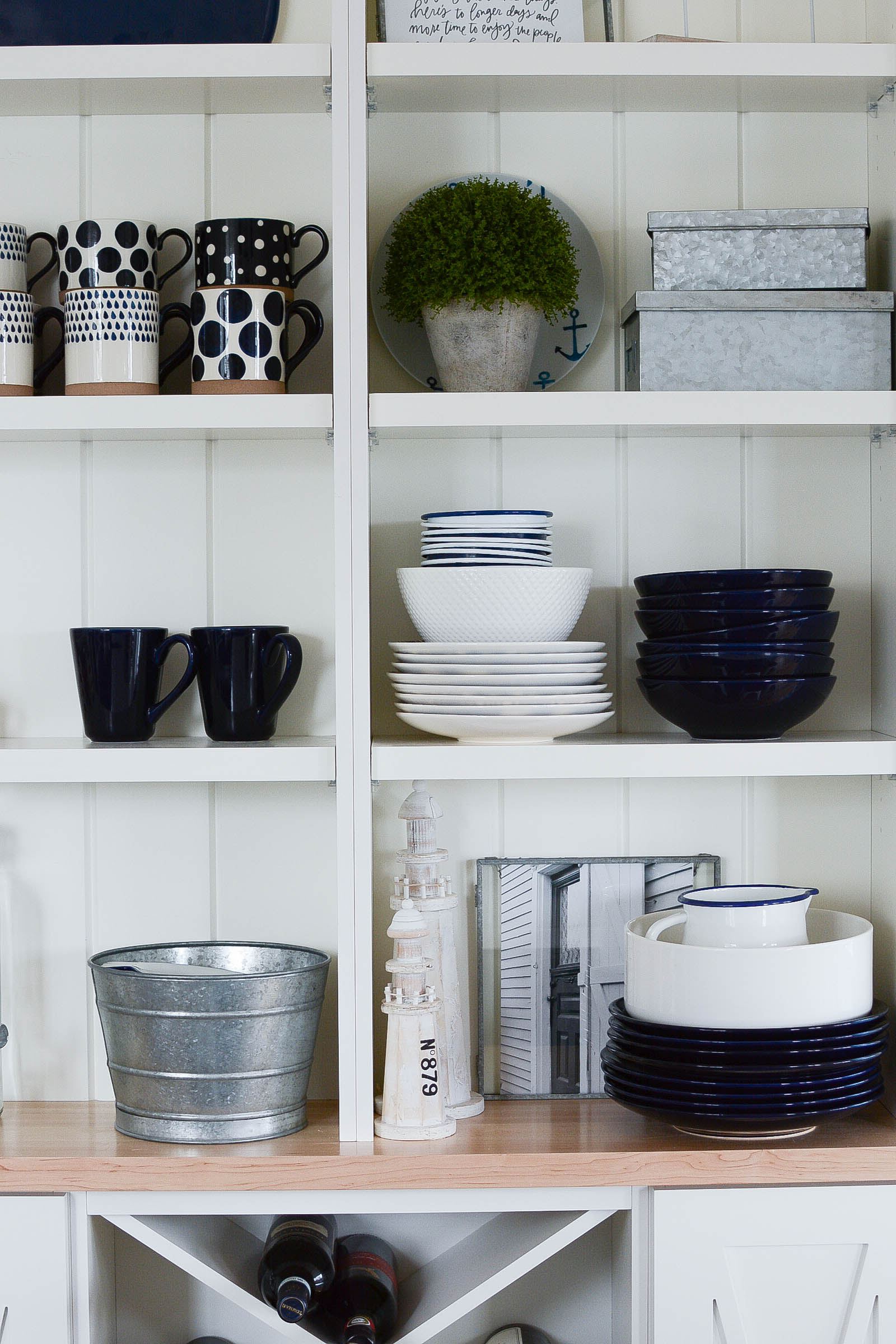 Coastal farmhouse style open shelving in kitchen (nautical style)