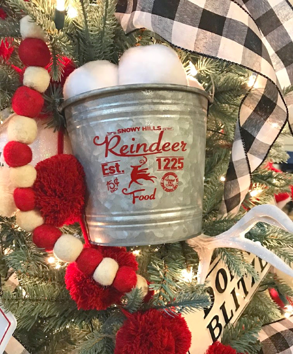 North Pole themed Christmas tree bucket of snowballs