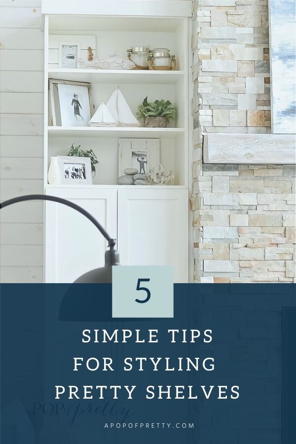 Shelf styling with neutral shelf decor